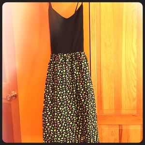 Mini dress with rose buds on the skirt.